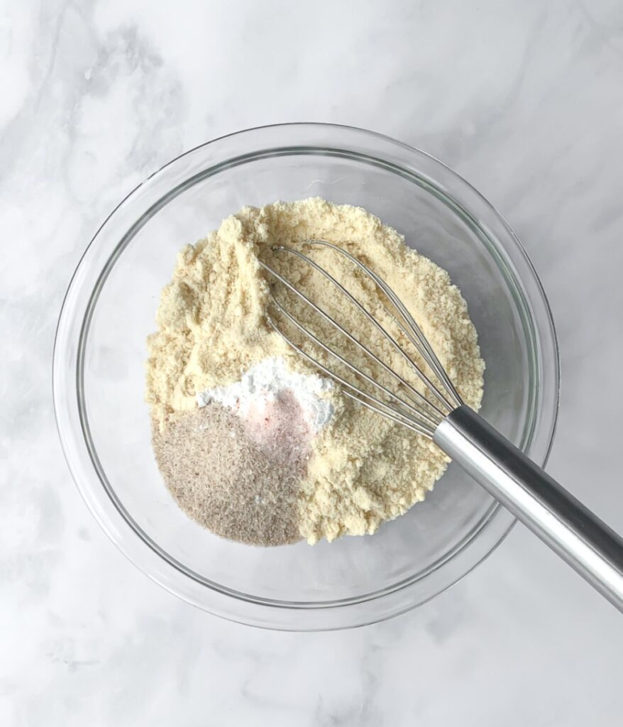 dry ingredients in a bowl with a whisk