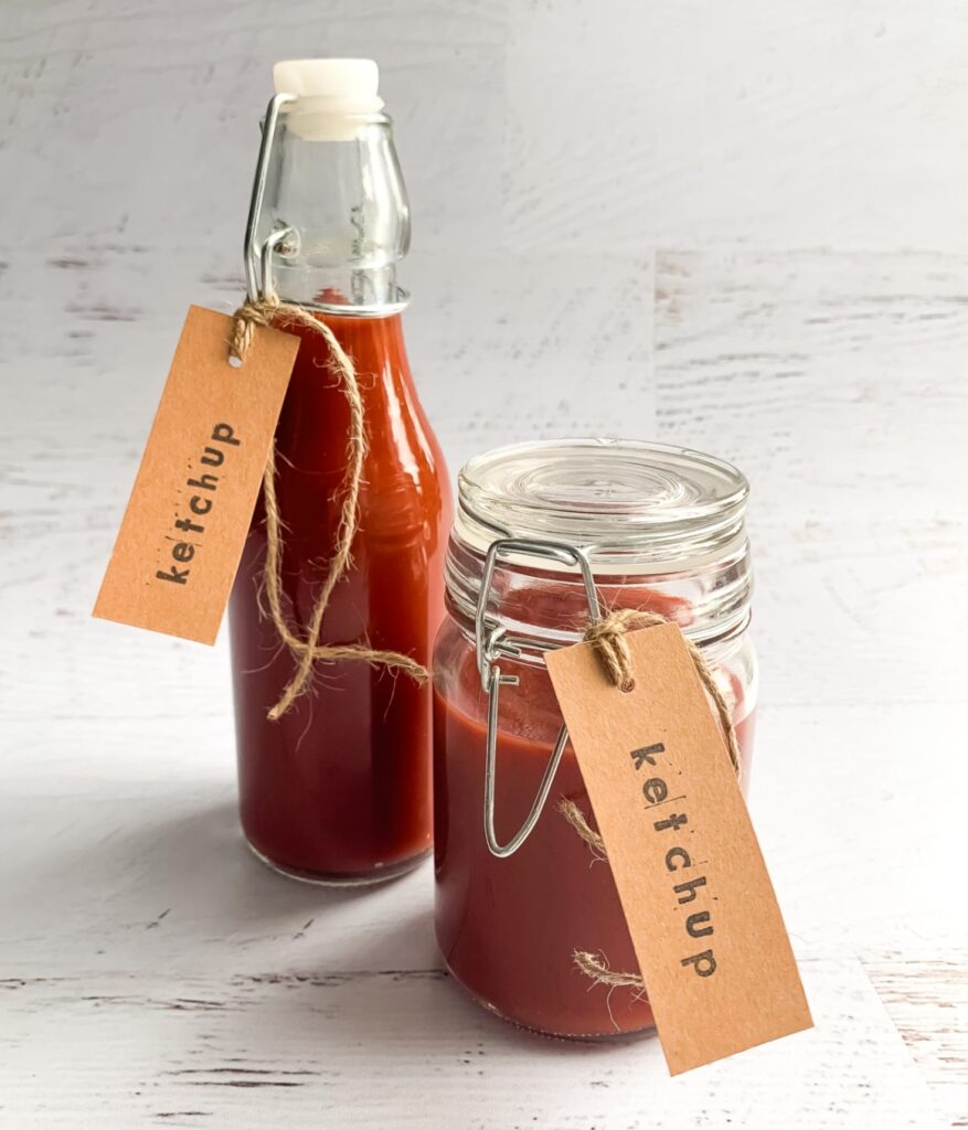 ketchup in pretty glass jars with decorative labels