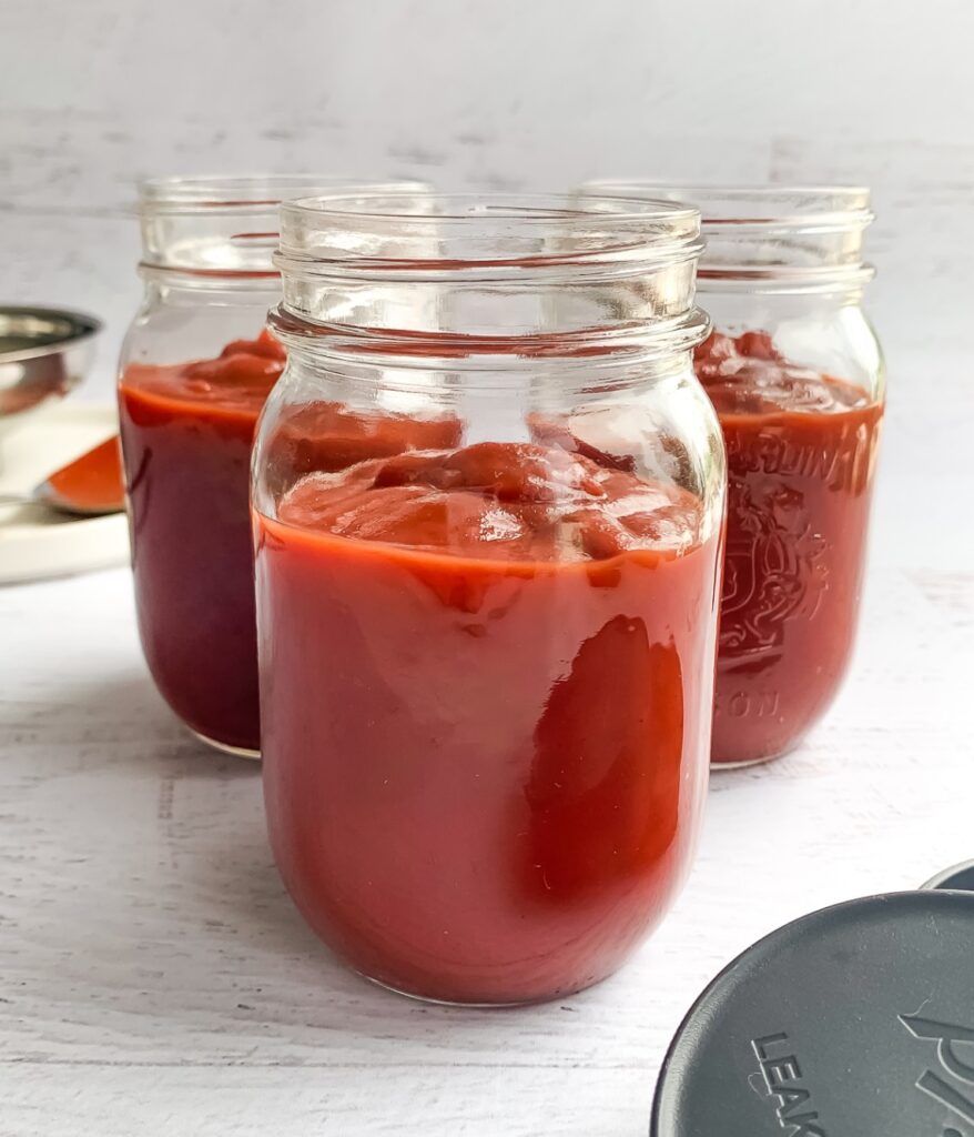 3 jars with ketchup