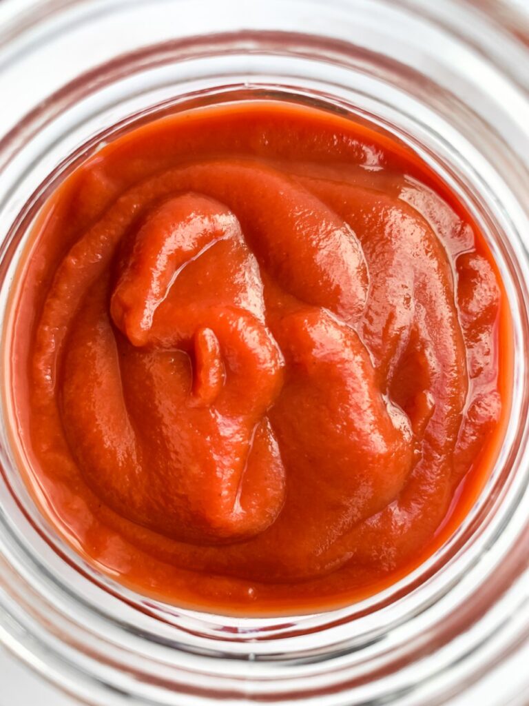 top down close up of ketchup in jar