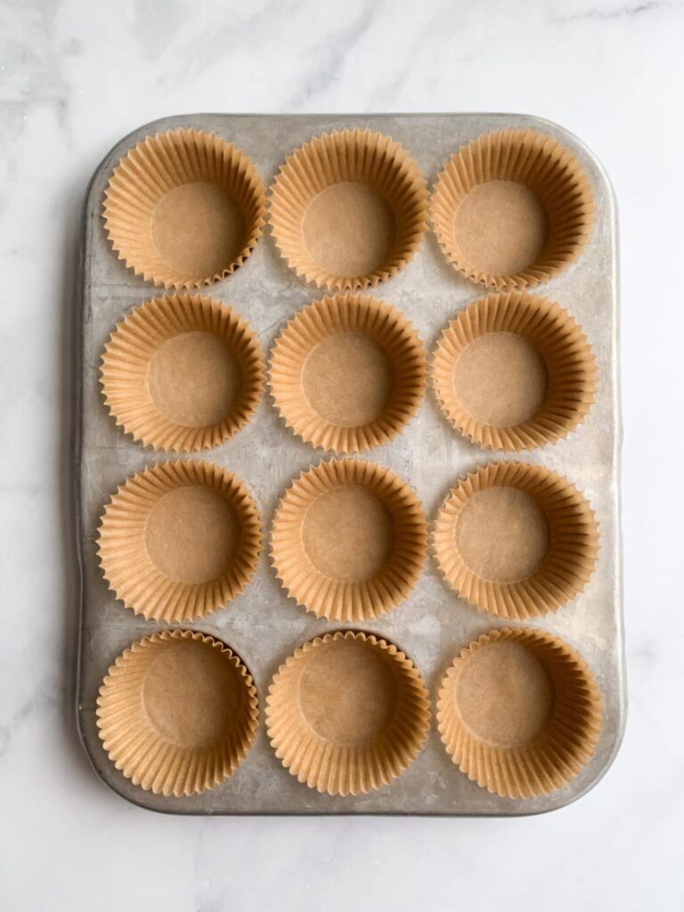 muffins liners in a muffin tin.